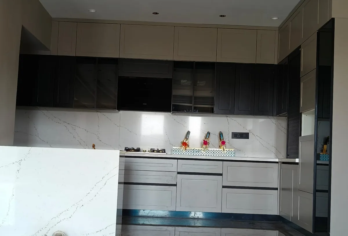 Vastu-aligned modular kitchen in apartment — South-East placement — DesigningAxis by Shivani
