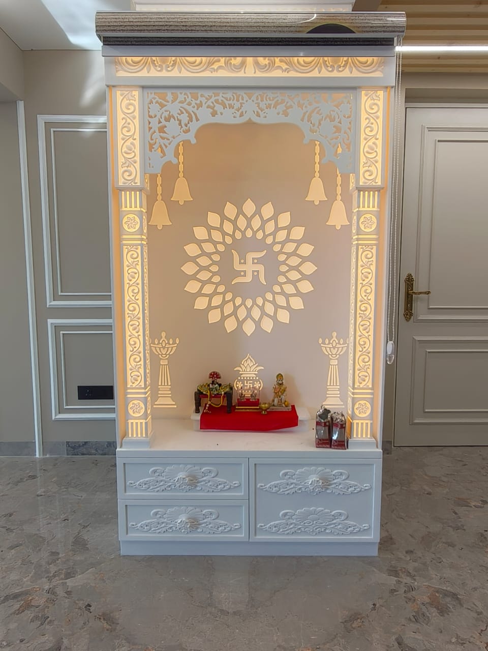 Spiritual prayer room with Navkar mantra wall and arch lighting, Delhi